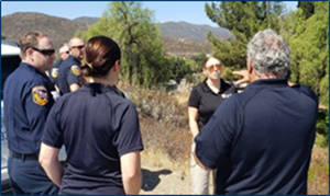 Interagency staff from CAL FIRE and Cal OES discussing home hardening needs