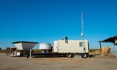 Clark King sets up a new atmospheric river observatory on Twitchell Island