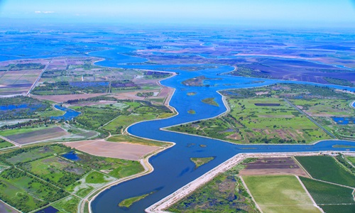Aerial view looking north at left to right Mandeville Island, Middle River and Medford Island all are part of the Sacramento-San Joaquin River Delta in San Joaquin County, California. Photo taken May 11, 2023.