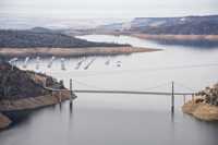 An aerial view of lake levels and Bidwell Bar Bridge at Lake Oroville in Butte County, California.  On this date, the water storage was 2,324,550 acre-feet (AF), 66 percent of the total capacity.  Photo taken December 14, 2023.