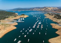 A drone view of houseboats at Bidwell Canyon Marina on Lake Oroville in Butte County, California.  On this date, the water storage was 2,243,714 acre-feet (AF), 66 percent of the total capacity. Photo taken September 5, 2024.