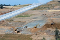 A view of the Lake Oroville main spillway as heavy equipment crews work to remove blast material from the nearby hillside at the Butte County, California site. Photo taken May 30, 2019.