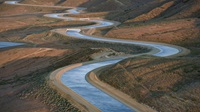 A windy stretch of the East Branch California Aqueduct in Palmdale, California, located in Los Angeles County near mile post 327.50 on May 12, 2023.