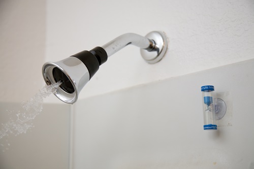 Water efficient shower head