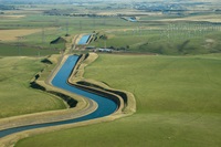 The Delta–Mendota Canal is a 117-mile-long aqueduct in central California, United States. The canal was designed and completed in 1951 by the U.S. Bureau of Reclamation as part of the Central Valley Project to supply freshwater to users downstream of the San Joaquin River.