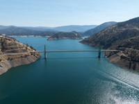 A drone view of Bidwell Bar Bridge at Lake Oroville in Butte County, California.