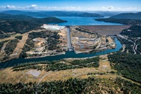 An aerial overview of Lake Oroville and the reconstructed Lake Oroville main spillway and emergency spillway at the Butte County, California site.