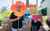 State fair attendees take a photo at DWR's booth.